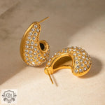 Gold hoop earrings with embedded crystals in 18k gold light luxury style design