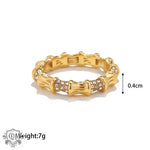 Gold-toned 18K Gold Bamboo Band Ring featuring elegant crystal accents