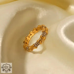 Gold-toned bamboo-style ring with embedded crystals from the 18K Gold Bamboo Band Ring collection