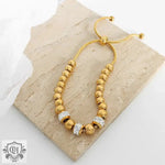 18K Gold Beaded Bracelet with Ring-Set Diamond Design - QH Clothing