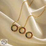 Gold necklace featuring vibrant gemstone circles in an 18K Gold Circle Design