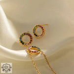 Gold-toned jewelry set featuring 18K Gold Circle Design with colorful gemstones