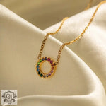 Gold necklace with rainbow-colored gemstones in 18K Gold Circle Design