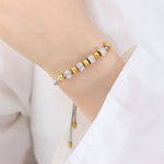 18K gold exquisite and noble round beads with cylindrical diamond design bracelet - QH Clothing