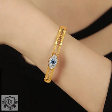 18K gold exaggerated devil’s eye diamond-set bracelet with sawtooth hollow design - QH Clothing