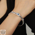 18K gold exaggerated devil’s eye diamond-set bracelet with sawtooth hollow design - QH Clothing