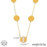 Gold-toned honeycomb design necklace featuring 18K gold geometric round inlaid gemstone