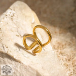 Gold-colored, double-banded ring featuring 18k gold in a simple style line design