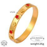 Gold-toned bangle featuring red and gold flowers in 18K gold light luxury style