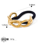 Gold chain hair tie showcasing 18K gold and geometric design in luxury hair accessories