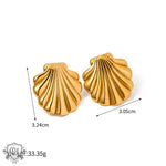 Gold seashell earrings in 18K gold, epitomizing light luxury and beach style elegance