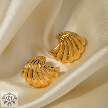 Pair of 18K Gold seashell earrings in a light luxury beach style design