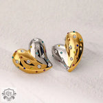 Two-toned heart-shaped earrings in high-quality 18K gold with colorful gems