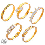 Collection of gold-toned bracelets showcasing 18K gold design elements with sparkling diamonds