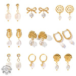 Gold-toned pearl earrings in light luxury style with ginkgo and bow design