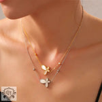 Layered butterfly pendant necklaces in 18K gold for daily wear and social occasions