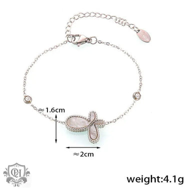 Silver bracelet with mother-of-pearl cross for daily wear and social occasions featuring 18K gold