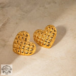 Pair of textured 18k gold heart-shaped earrings featuring a diamond pattern design