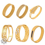 Assorted gold bangles showcasing 18K gold with unique artistic beauty and hollow designs