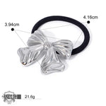 Silver bow hair tie in 18K gold light luxury style hair accessories collection