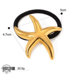 Gold starfish hair tie in 18K gold, epitomizing light luxury style in hair accessories