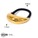 Gold-toned hair tie with black elastic in 18K gold light luxury style design