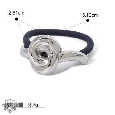 Silver knot hair tie featuring 18K gold in a light luxury style design