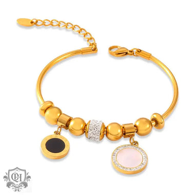 Gold-toned charm bracelet featuring high-quality 18K gold and round inlay design