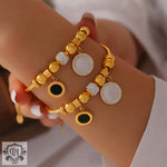 High-quality 18K Gold Fashionable Round Diamond and Gemstone Design Bracelet displayed