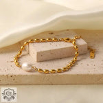 Elegant 18K Gold Freshwater Pearl Oval Beanie Bracelet showcasing a gold beaded design