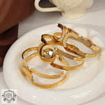 18K gold simple and elegant geometric hollow design light luxury style bracelet - QH Clothing