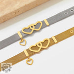 Two metal mesh bracelets with interlocking heart charms for an 18K Gold Love Bracelet