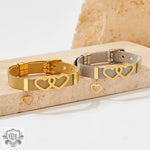 Two metal mesh bracelets featuring heart charms in a stylish 18K Gold Love Bracelet design