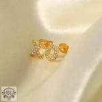 18K Gold Inlaid XO Letter Earrings featuring embedded crystals for a sparkling finish