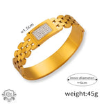 Gold-toned bracelet featuring a jeweled centerpiece in high-quality 18K gold geometric design