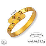 18K gold light luxury bracelet featuring floral gemstone accents and geometric design