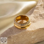 Elegant 18K Gold Multi-Layered Ring adorned with sparkling embedded crystals