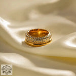 18K Gold Multi-Layered Ring featuring embedded crystals in a stunning design