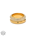 Gold multi-layered ring in 18K gold featuring embedded crystals for elegant style