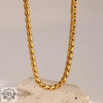 Elegant 18K gold braided chain featured in a bracelet necklace set with refined design