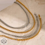 Elegant 18K gold and silver snake chain design bracelet necklace set for a chic look