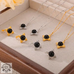 Gold and silver necklaces with black stone pendants in light luxury style design