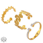 Three elegant 18K gold bracelets featuring a light luxury flower design