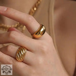 Elegant 18K Gold Ribbed Ring featuring a stunning gold dome design