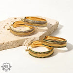 Gold hoop earrings featuring 18K Gold Ripple Inlaid Zircon gemstones for elegant style