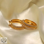 Gold hoop earrings with crystal accents featured in 18K Gold Ripple Inlaid Zircon design