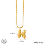 Gold H initial necklace in 18K gold, embodying light luxury style and elegance