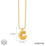 Elegant 18K gold ’C’ pendant necklace in light luxury style for sophisticated fashion