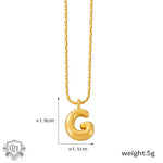 Gold letter G pendant on an 18K gold light luxury style necklace