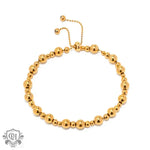 Gold-toned beaded bracelet with adjustable chain in gold simple ball design